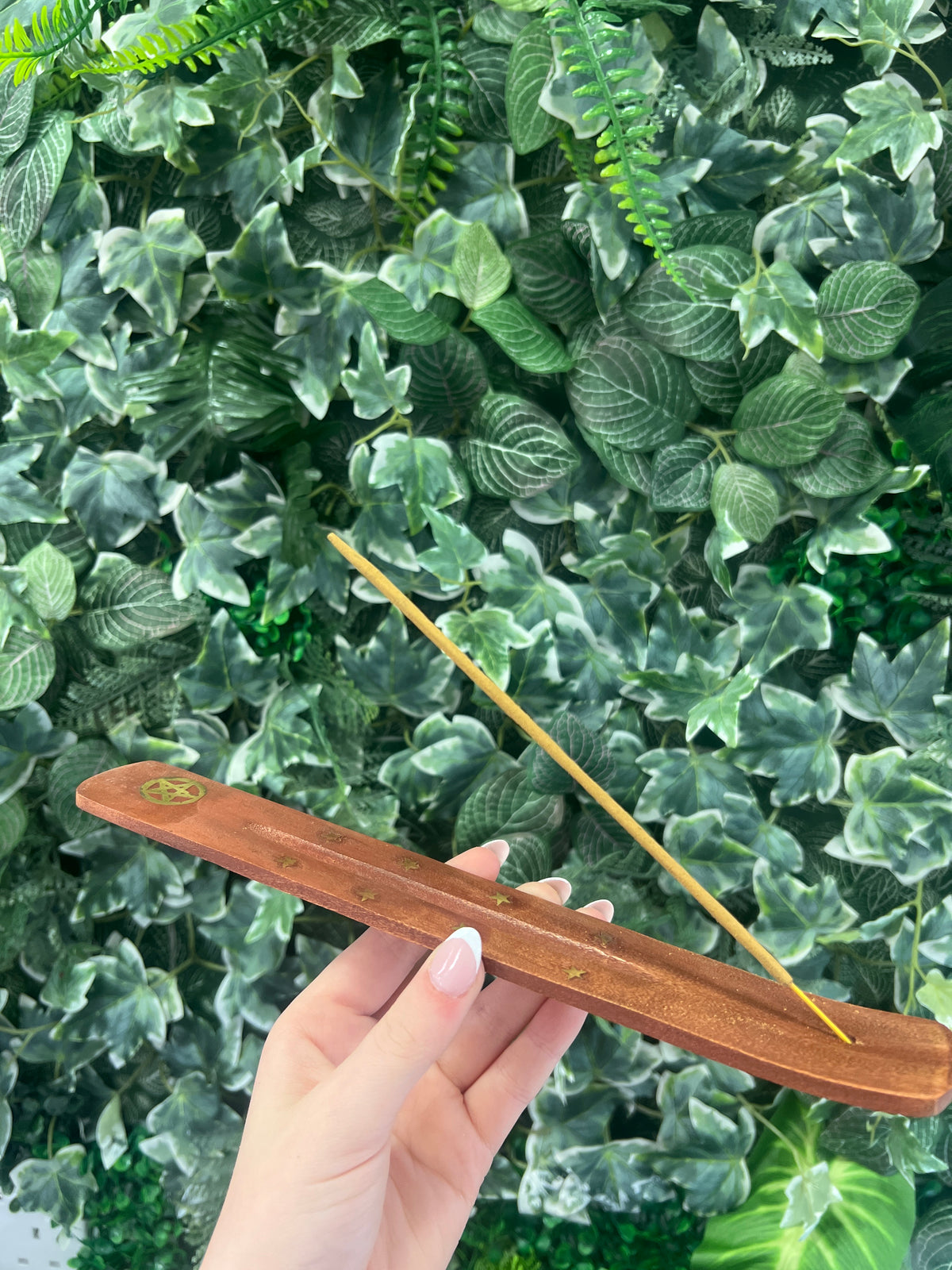 wooden and gold incense holder