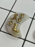 Gold charm pendants