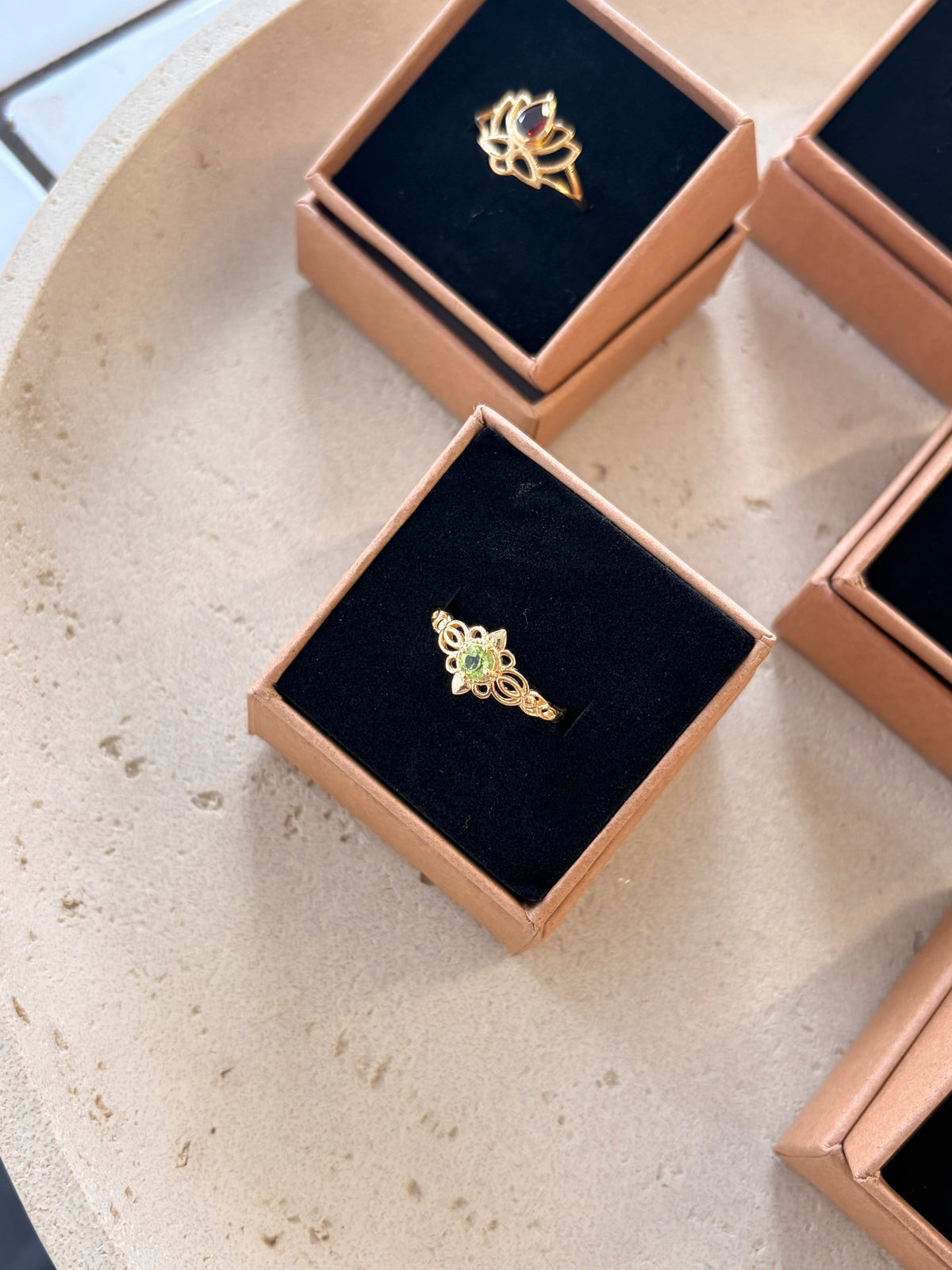 Peridot floral detail ring