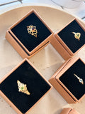 Peridot floral detail ring