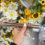 Long gold hand holder