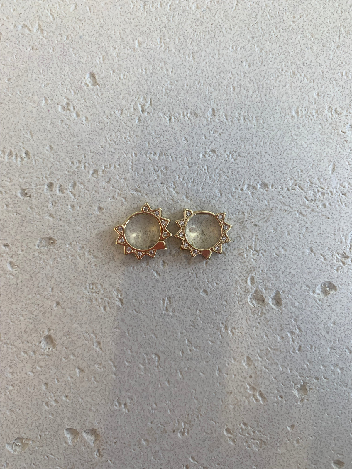 Gold spike huggie hoops