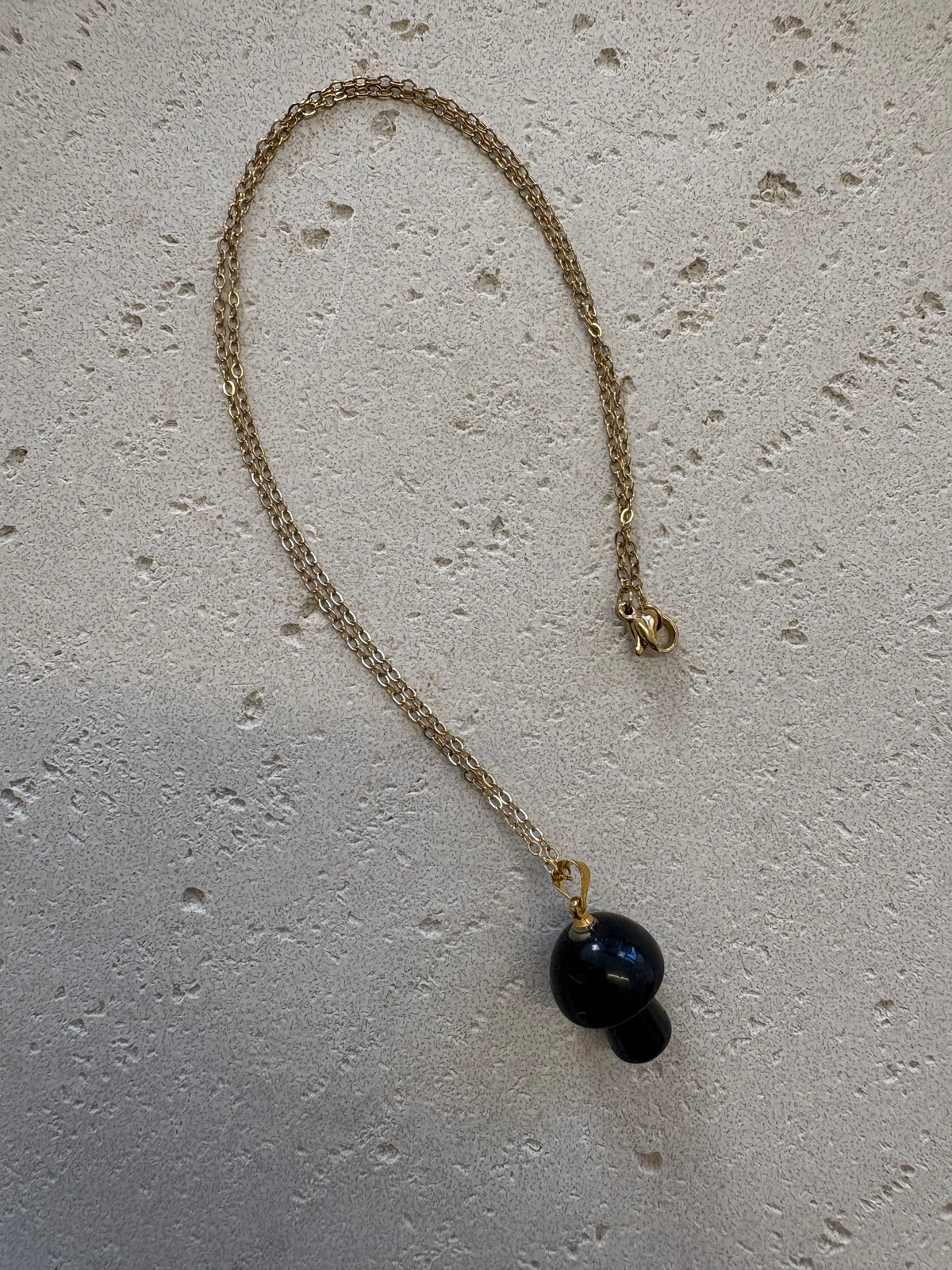 Gold mushroom pendant necklace