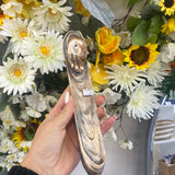 Long gold hand holder