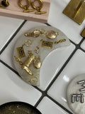 Gold charm pendants