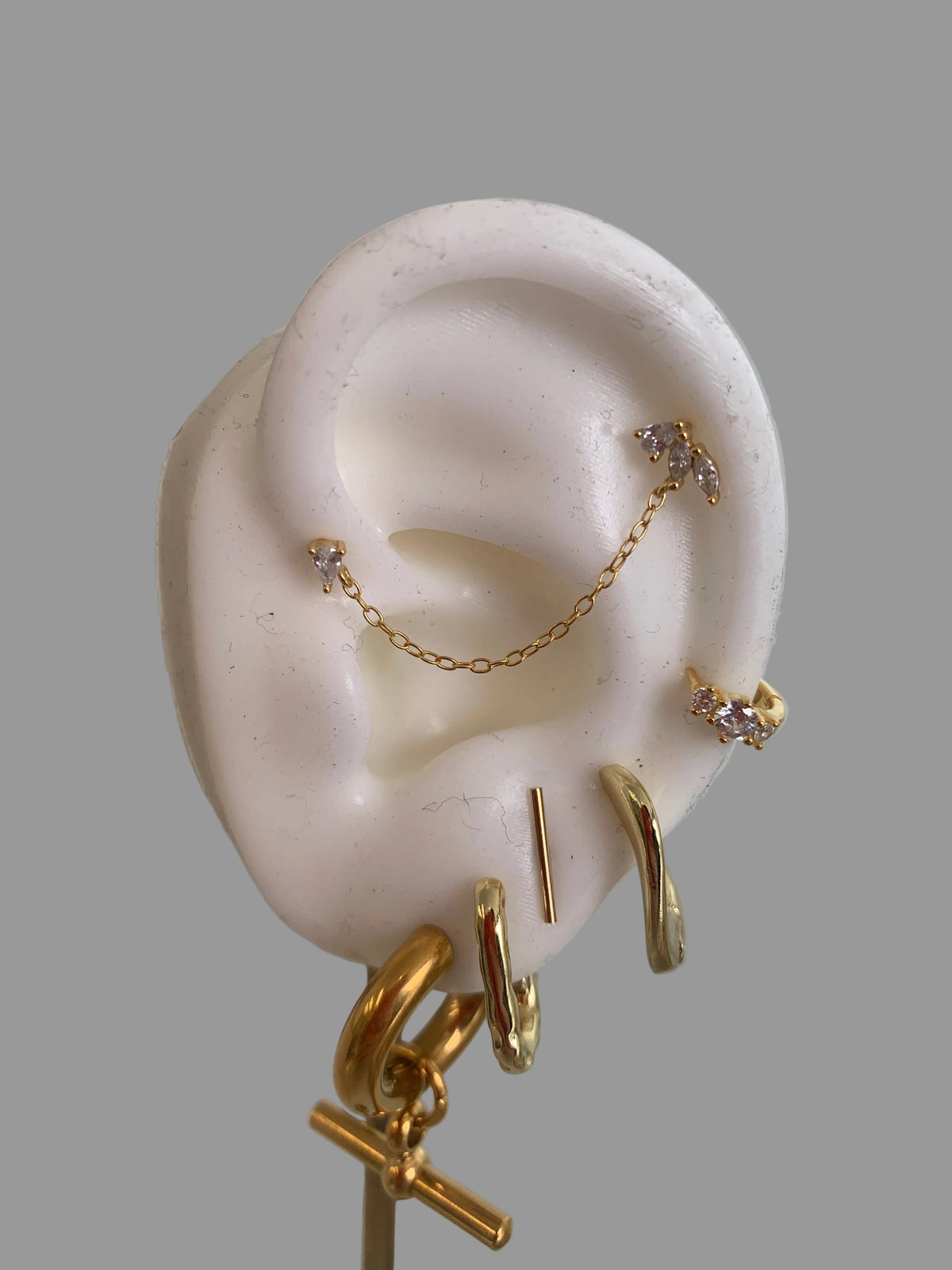 Triple chain stud gold
